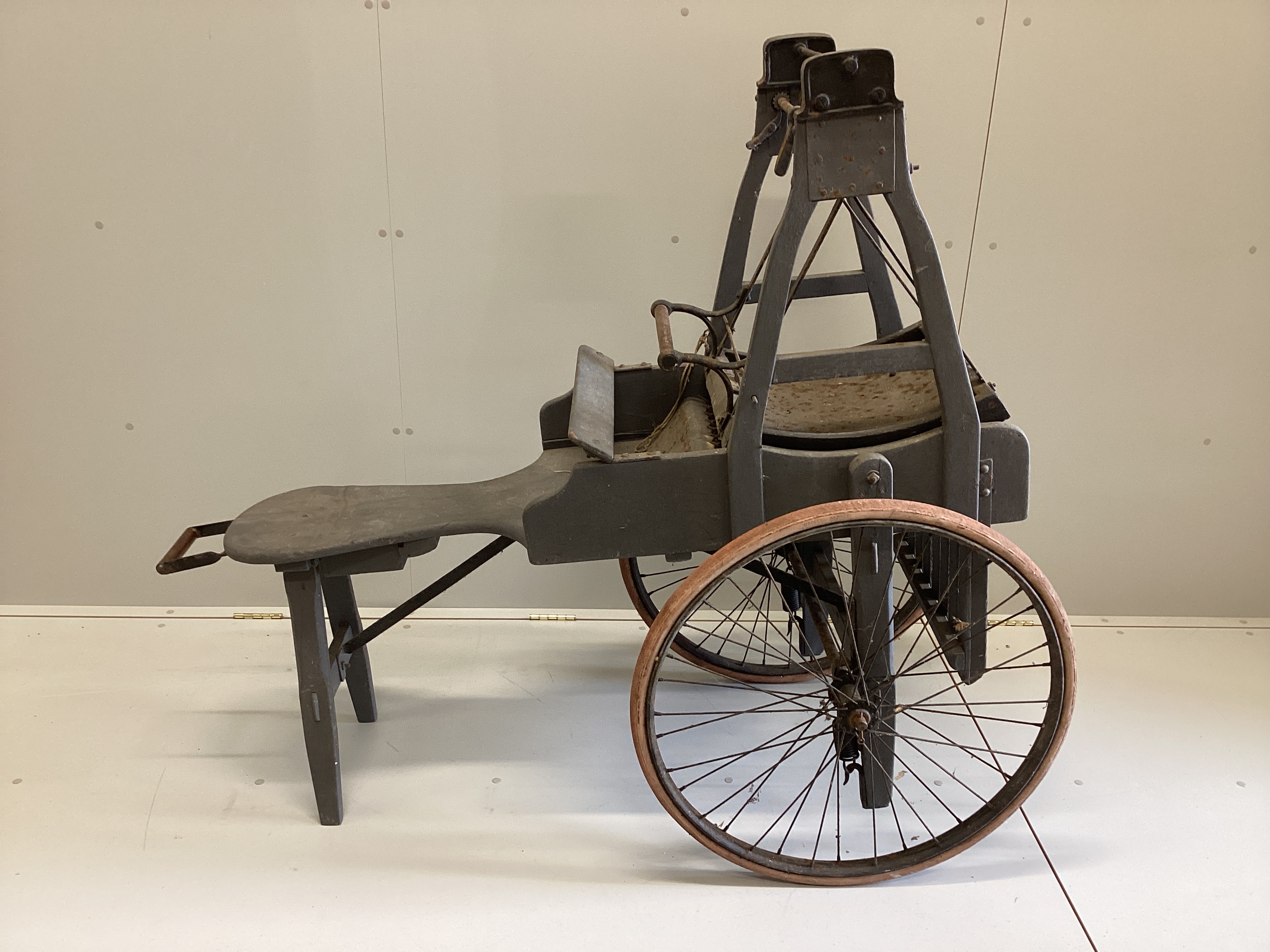 A late 19th / early 20th century French painted wood and iron wool threshing cart, length 146cm, height 131cm